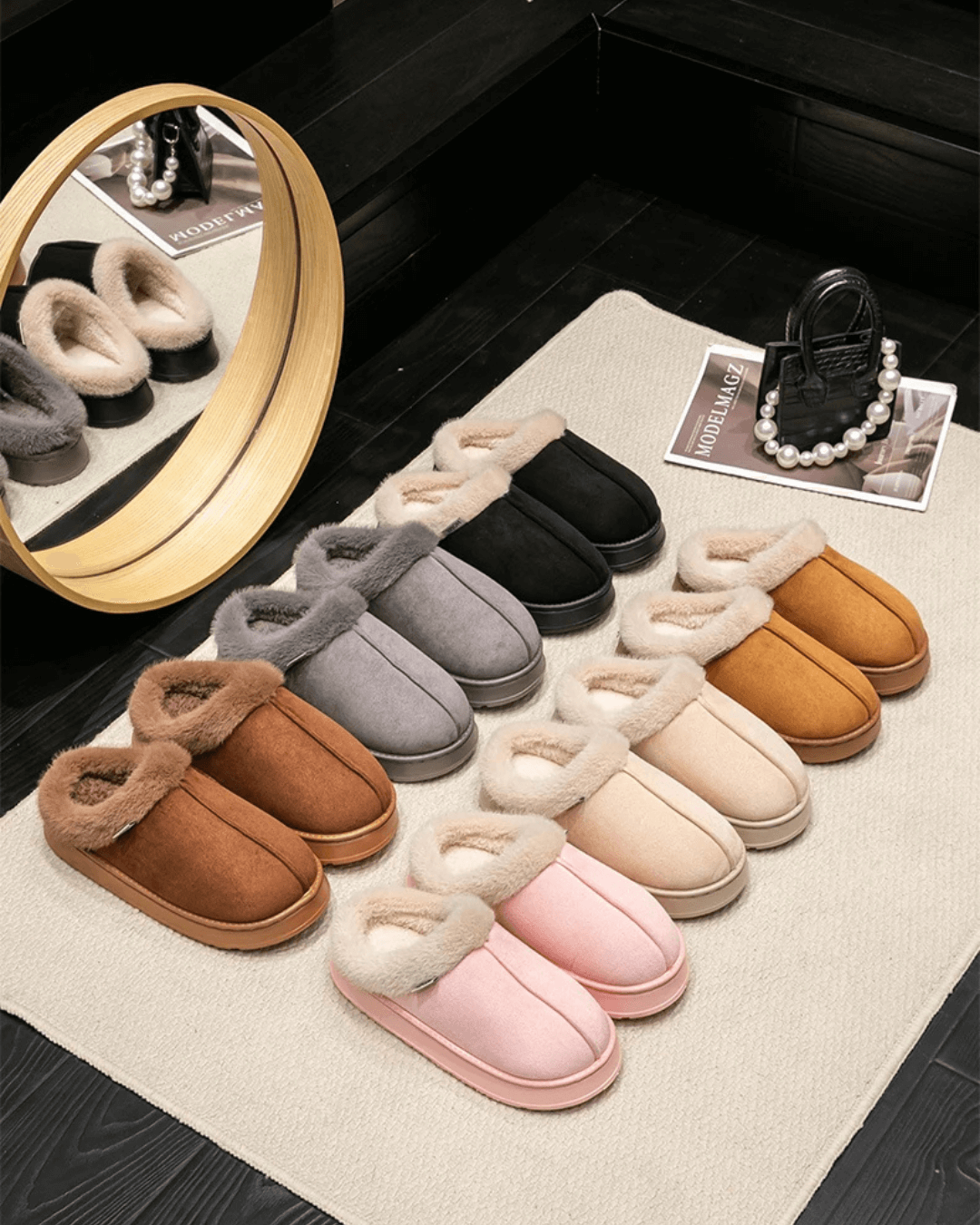 Variety of autumn and winter plush slippers in soft colors displayed on a rug, showcasing cozy indoor comfort.
