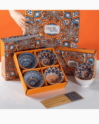 Hand-painted ceramic bowl set with chopsticks in vibrant gift box, featuring unique Bohemian designs.