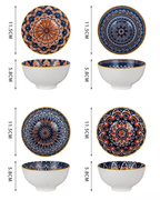 Hand-painted ceramic bowl set with unique Bohemian designs, showcasing vibrant patterns and elegant shapes.