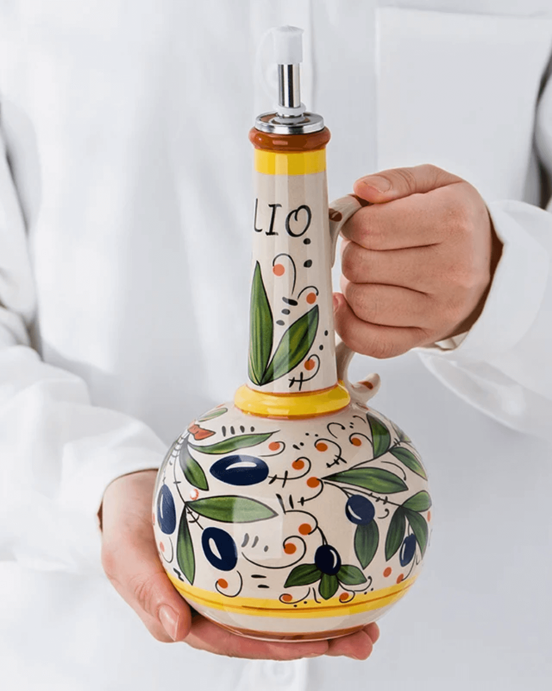 Hand-painted ceramic olive oil dispenser with a leak-proof metal spout and vibrant olive motif.