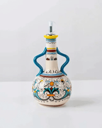 Hand-painted ceramic olive oil dispenser 550ml with a leak-proof spout and colorful design.