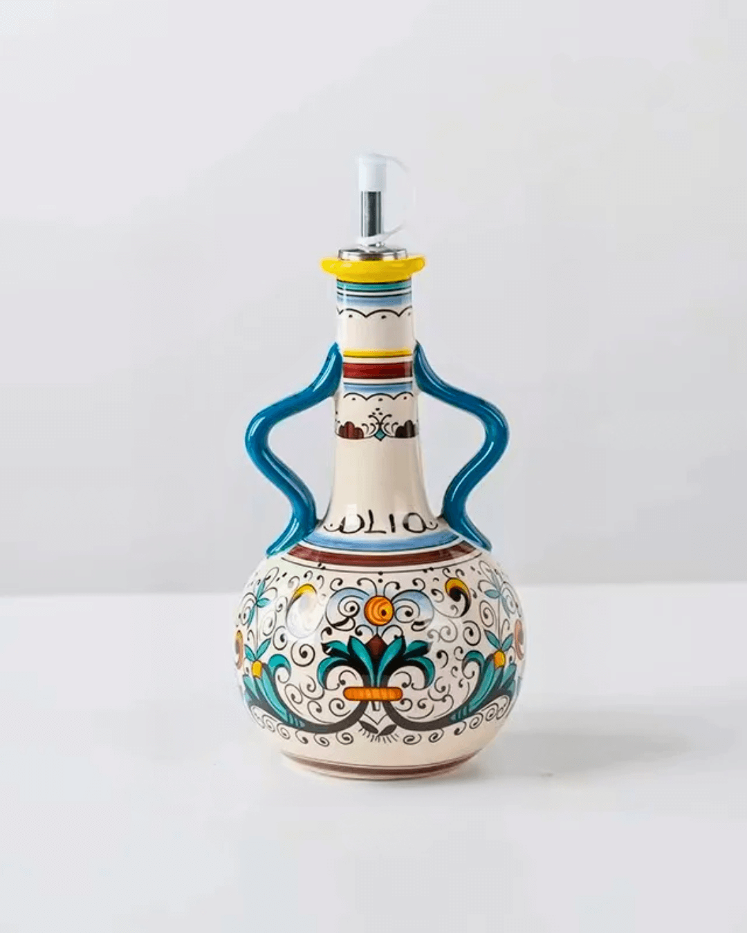 Hand-painted ceramic olive oil dispenser 550ml with a leak-proof spout and colorful design.