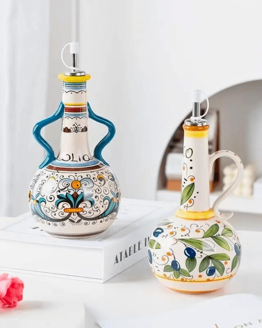 Hand-painted ceramic olive oil dispensers with leak-proof spouts, showcasing Mediterranean style and vibrant colors.