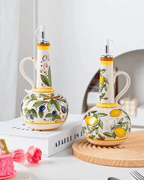 Hand-painted ceramic olive oil dispensers, featuring colorful designs and drip-free spouts, perfect for kitchen decor.