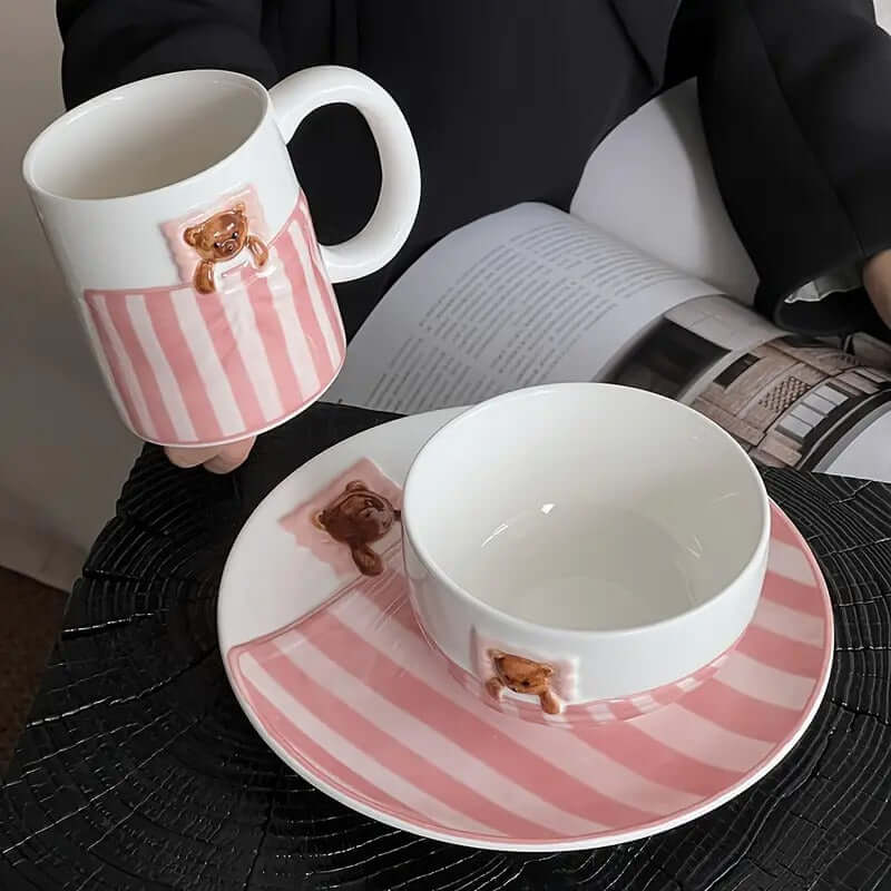 Sweet Dream Bear ceramic tableware set including mug, bowl, and plate with whimsical bear design.