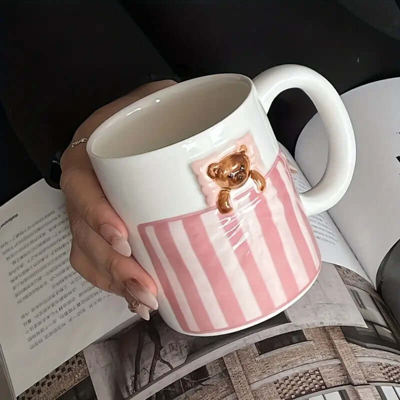 Ceramic mug featuring a whimsical bear design with pink stripes, part of the Sweet Dream Bear Tableware Set.