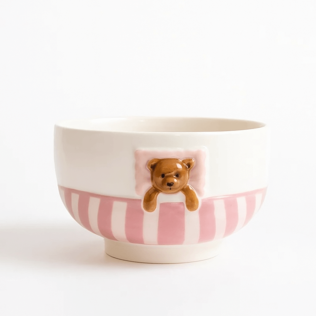 Ceramic bowl from Sweet Dream Bear Tableware Set with whimsical bear design and pink stripes.
