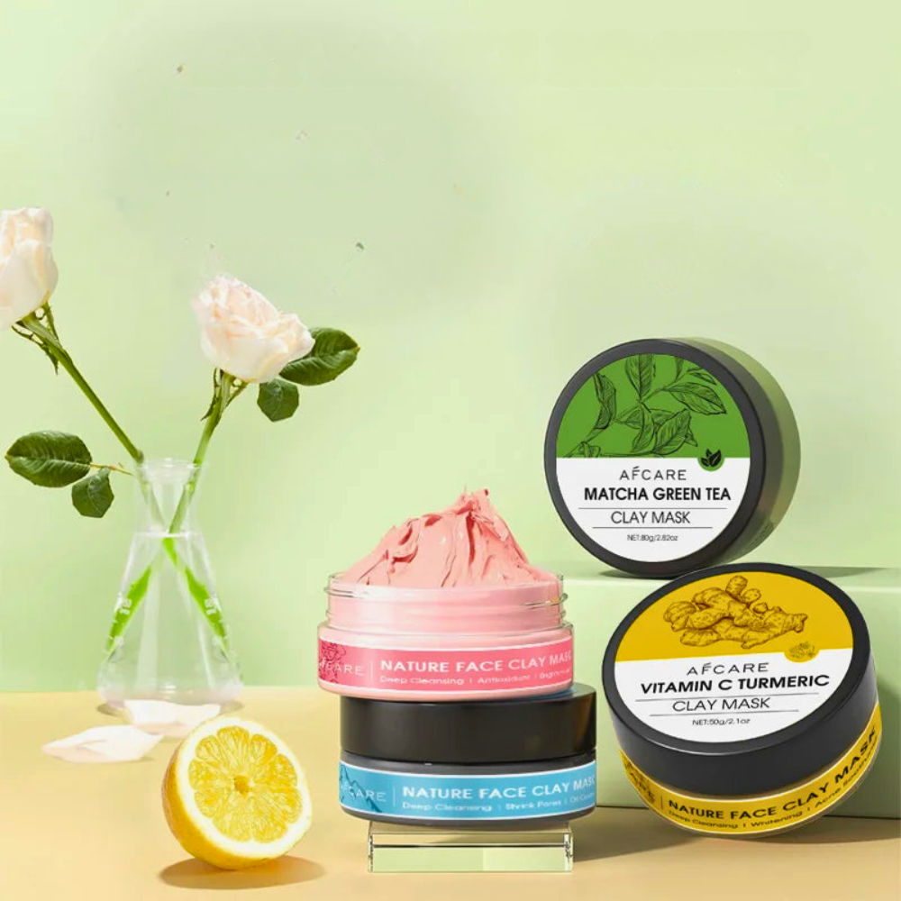 4-in-1 Clay Face Mask Set featuring Matcha Green Tea and Vitamin C Turmeric, with fresh lemon and roses.