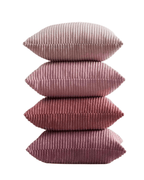 Stack of four soft pink corduroy throw pillow covers in various shades, showcasing a boho style.