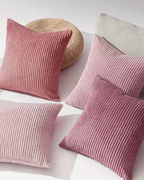 Soft pink corduroy decorative pillow covers in various shades, showcasing a boho style for home decor.