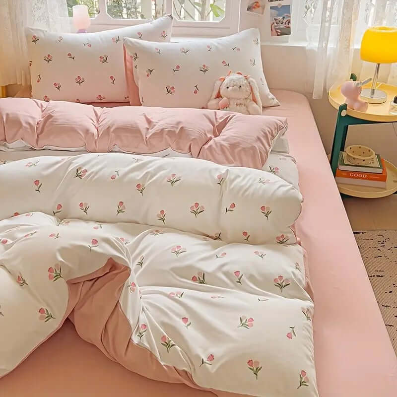 Duvet Cover Set featuring floral cream and pink design with tulips, lightweight microfibre bedding in a cozy bedroom setting.