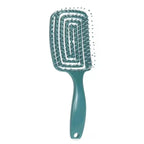 Detangling hair brush with hollow vent design for fast drying and scalp massage, ideal for smooth, healthy hair.