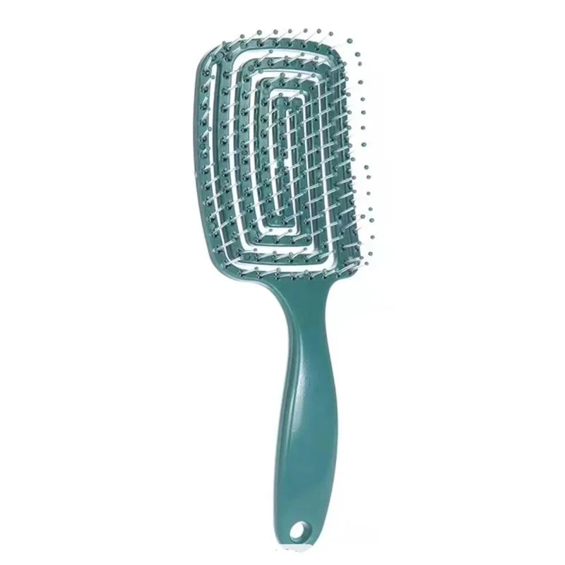 Detangling hair brush with hollow vent design for fast drying and scalp massage, ideal for smooth, healthy hair.