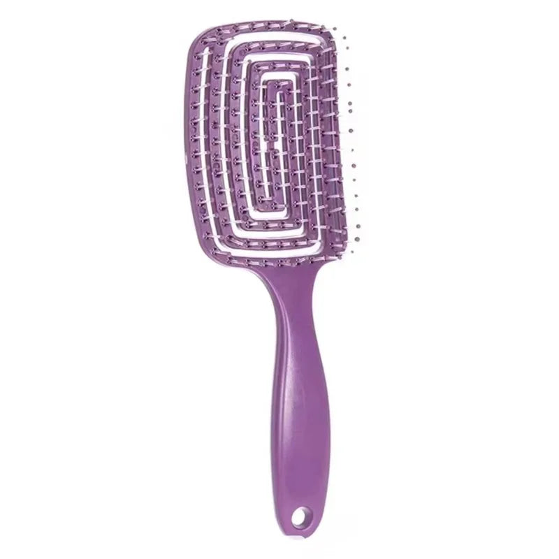 Hollow vent detangling hair brush in purple, designed for quick drying and soothing scalp massage.