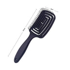 Detangling hair brush with hollow vent design for fast drying and soothing scalp massage, measuring 24cm x 8cm.