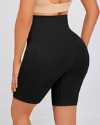 High-waist seamless shapewear shorts in black, providing tummy control and a smoothing silhouette for all-day comfort.