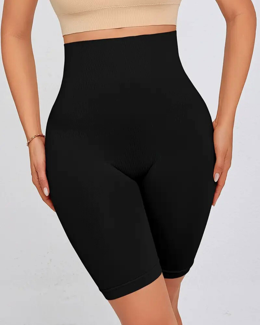 High waist seamless shapewear shorts in black for tummy control and smoothing.