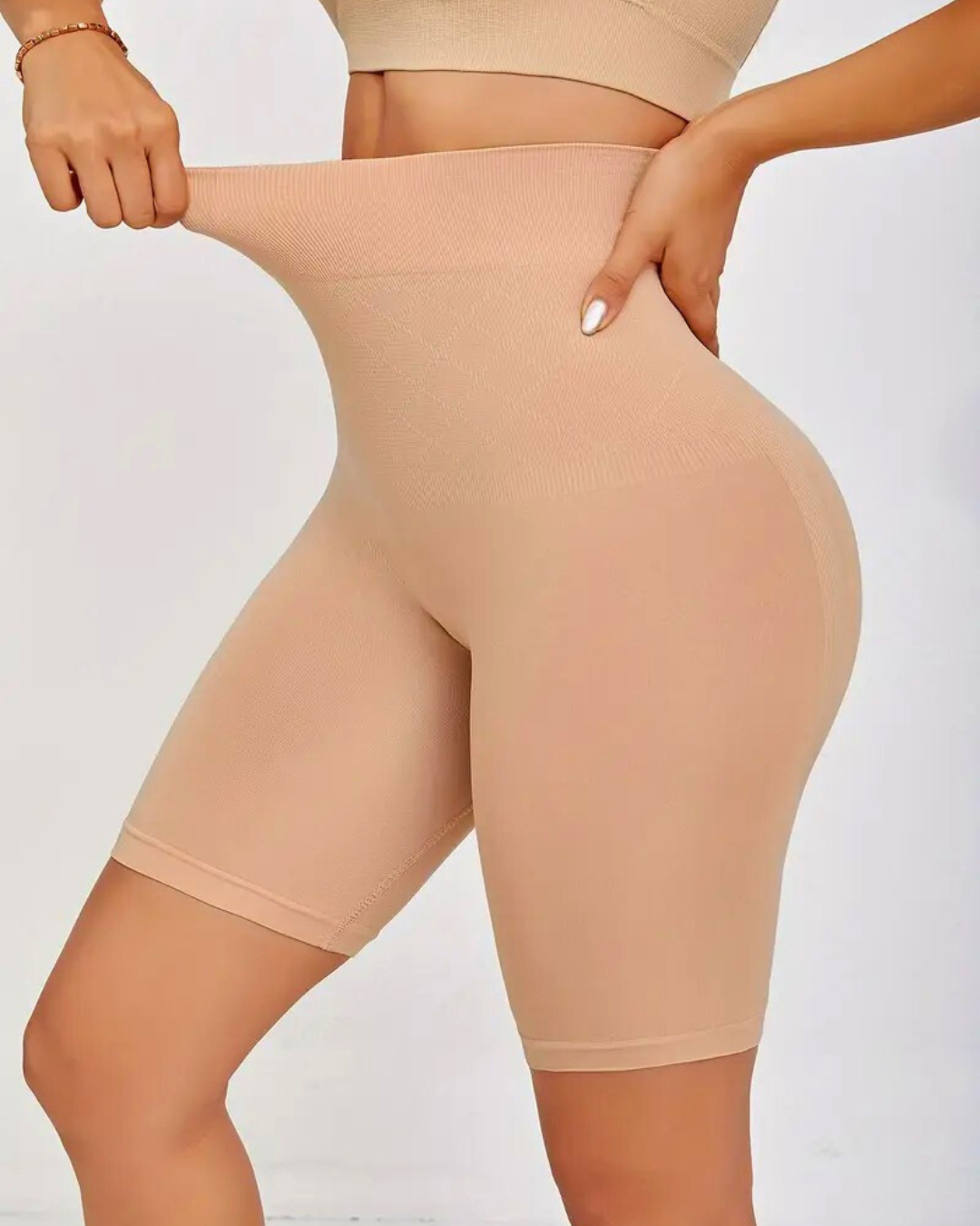 High waist seamless shapewear shorts demonstrating tummy control and smoothing features.
