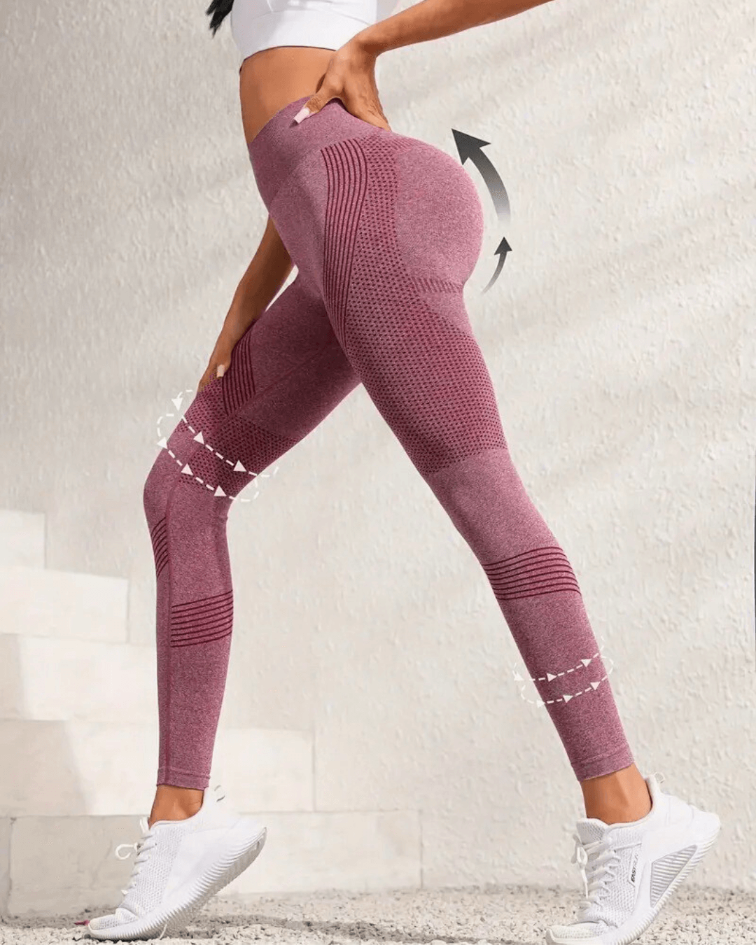 Model showcasing high-waist butt-lifting yoga leggings in burgundy, ideal for workouts and everyday wear.