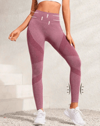 High-waist squat-proof yoga leggings with tummy control and butt-lifting design for all-season workouts.