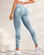 High-waist aqua blue yoga leggings showing tummy control and butt-lifting features, ideal for workouts and lifestyle.