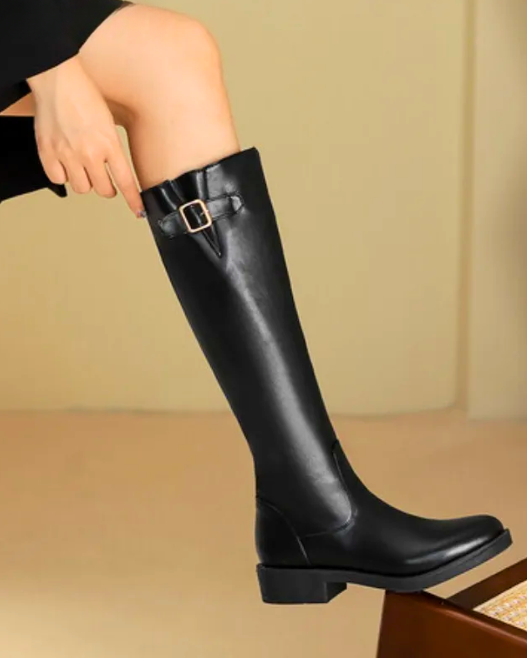Black knee-high vintage punk boots with buckle detail and thick block heels, perfect for autumn and winter fashion.