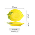 Lemon-shaped ceramic plate with leaf design, 25cm, adds playful charm to tableware for snacks and desserts.