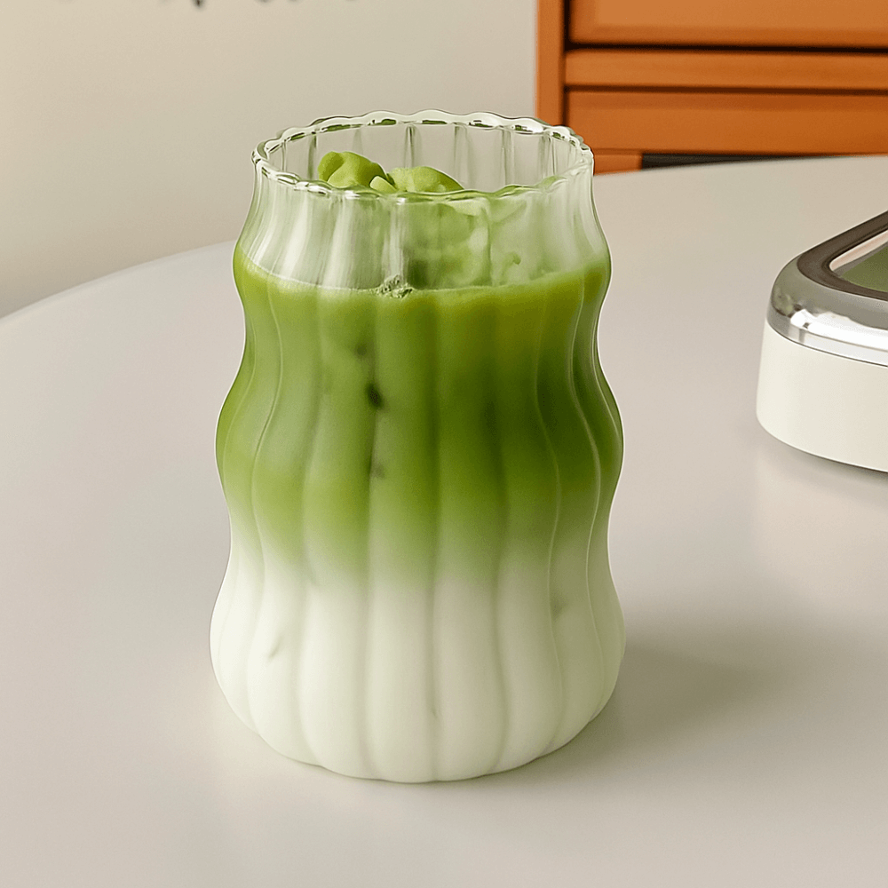 500ml heat-resistant wavy tumbler with iced matcha and layered latte, modern design for stylish drinking.