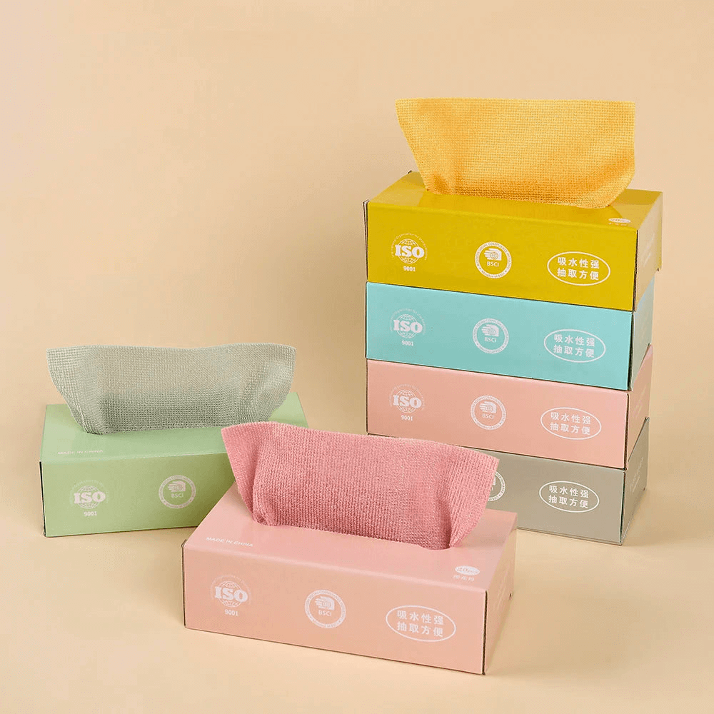 Colorful microfibre cleaning cloths in boxes, including green, pink, and yellow, ideal for lint-free drying.
