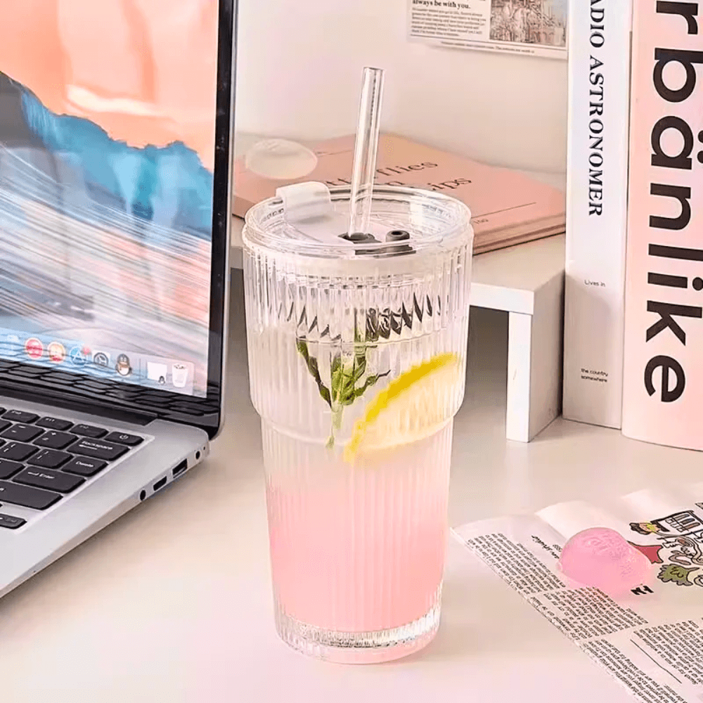 Matcha glass tumbler with lid and straw, 600ml ribbed cup, featuring a refreshing pink drink with lemon.