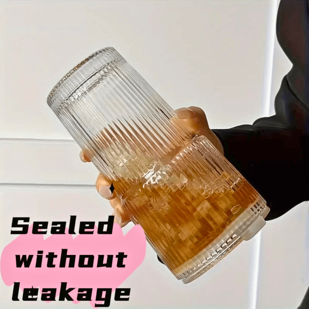 Matcha glass tumbler with ribbed texture, clear lid, and ice-filled drink, showcasing leakage-free design.