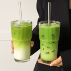 Two frosty matcha drinks in a ribbed glass tumbler with clear straw, showcasing iced matcha and layered tea.