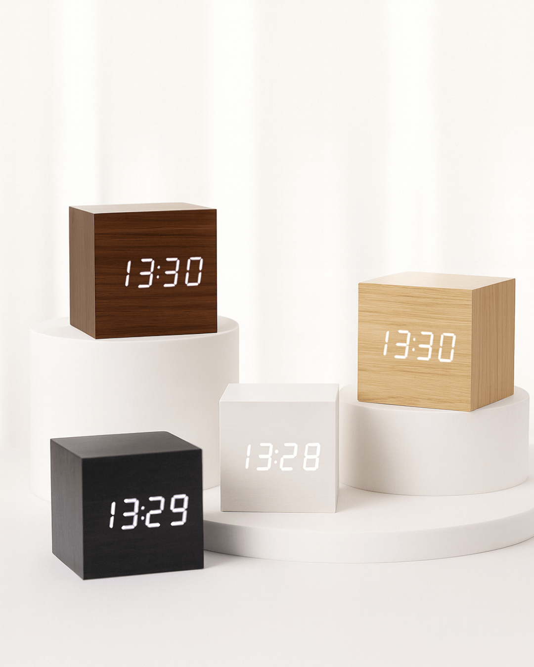 Mini LED digital alarm clocks in various colors displaying time, showcasing adjustable brightness and modern design.