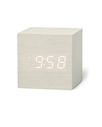 Mini LED digital alarm clock in a sleek white cube design displaying 9:58 time on an LED screen.