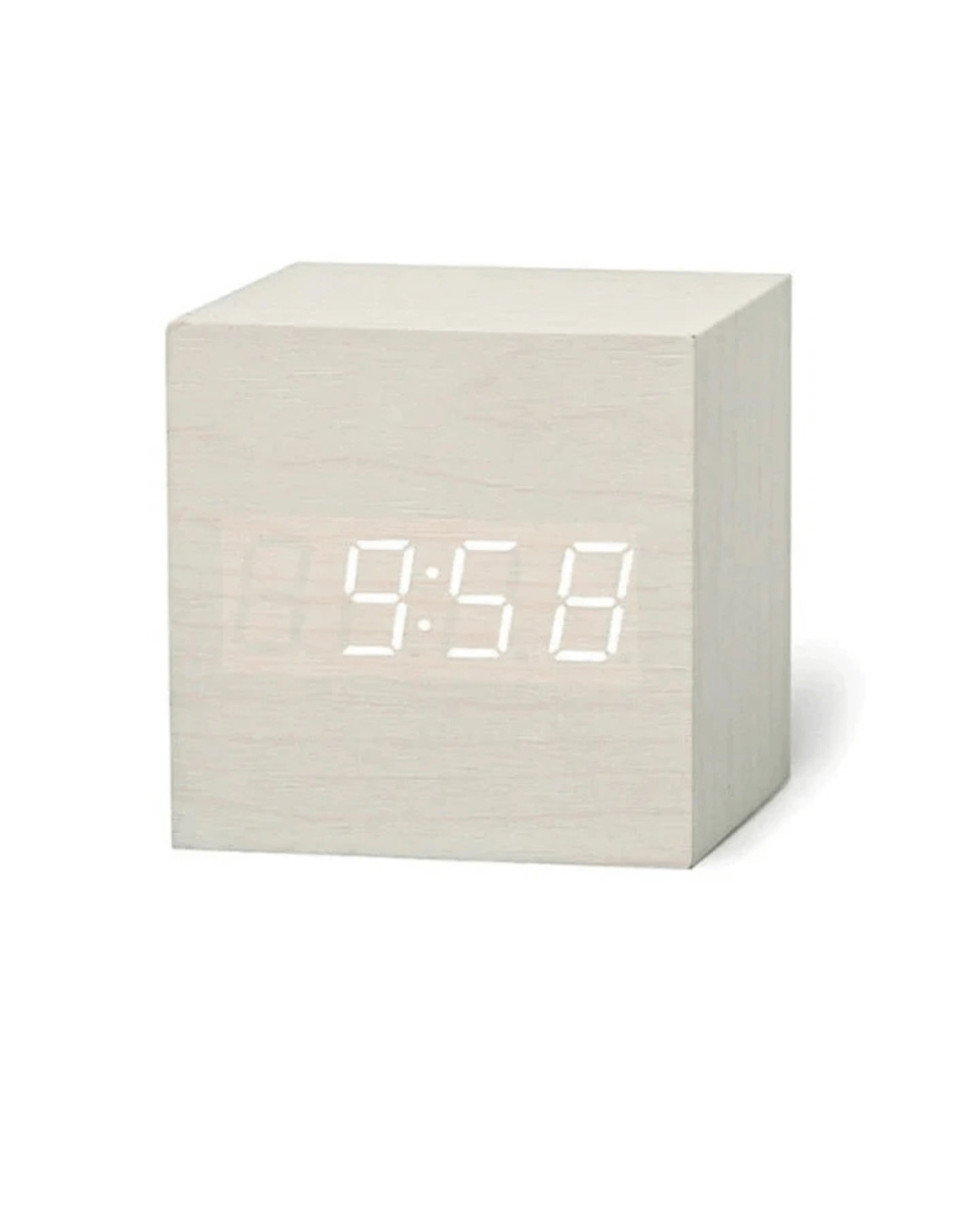 Mini LED digital alarm clock in a sleek white cube design displaying 9:58 time on an LED screen.