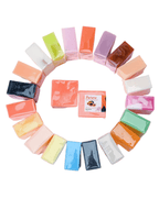Colorful assortment of soap bars arranged in a circle, showcasing various scents and vibrant colors.