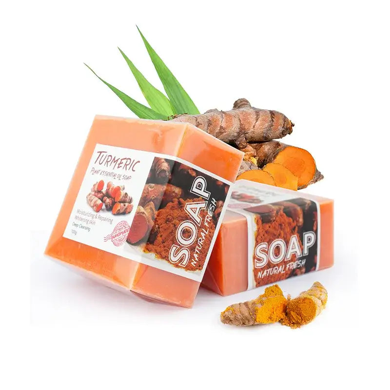 Turmeric soap bars with fresh turmeric roots, highlighting natural ingredients for glowing skin.