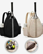 Padel/tennis backpack featuring quilted racket compartment in black and beige, with side bottle holders and interior storage.