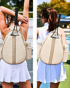Stylish padel/tennis backpack with quilted racket compartment, worn on a player's back at a tennis court.