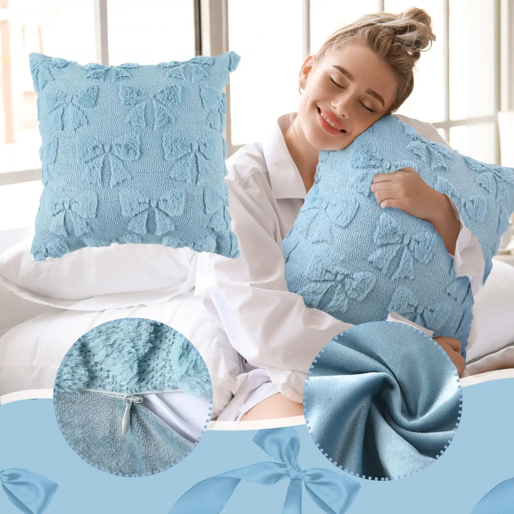 Plush blue cushion cover with quilted bow texture, perfect for adding comfort and style to any living space.
