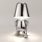 Stylish LED figure lamp with a modern chrome finish, perfect for creating a cozy atmosphere in any room.