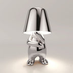 Stylish LED figure lamp in a shiny metallic finish, featuring a modern and playful design for cozy ambiance.