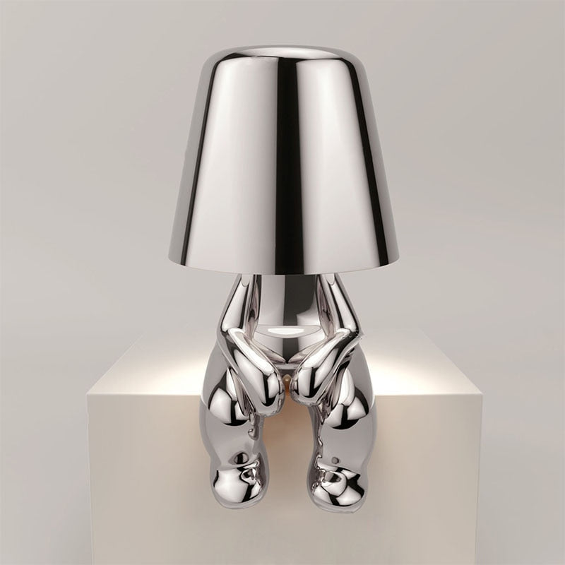 Stylish LED figure lamp with a modern design and touch dimmer functionality, perfect for creating a cozy atmosphere.