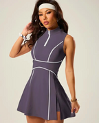 Padel tennis dress with built-in shorts, zip polo neck, and side slit for optimal movement and comfort.