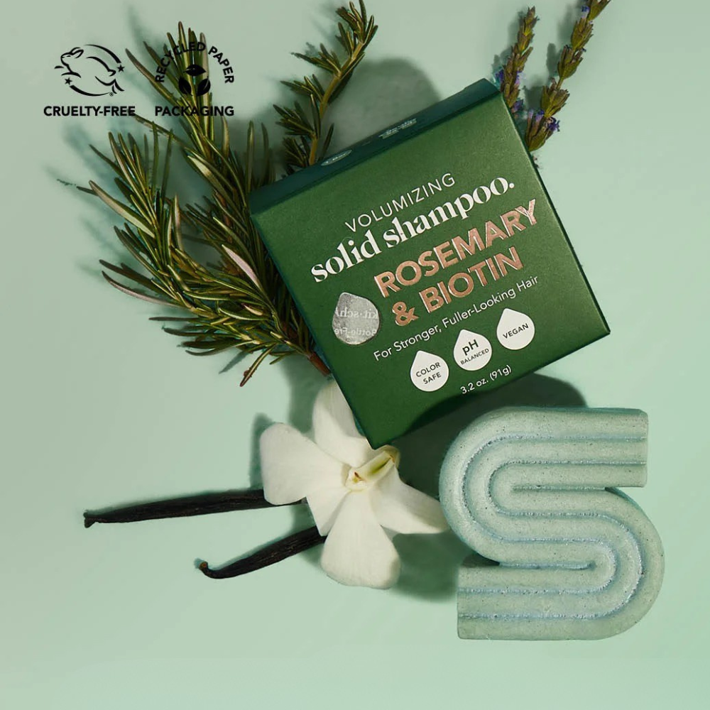 Volumizing solid shampoo bar with rosemary and biotin for fuller hair, featuring cruelty-free and eco-friendly packaging.