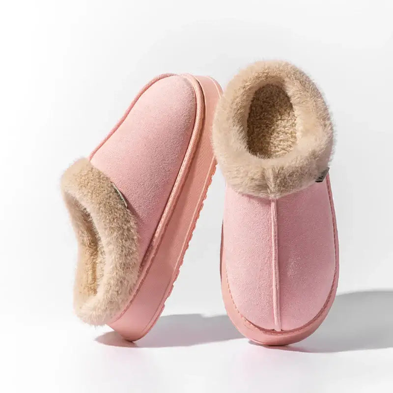 Pink autumn and winter plush slippers with soft lining and non-slip sole for cozy indoor comfort.