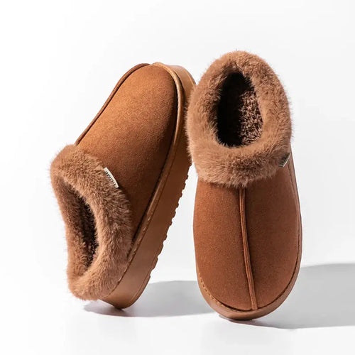 Cozy autumn and winter plush slippers with soft thermal lining and non-slip sole in brown color.
