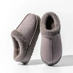 Cozy autumn and winter plush slippers in grey with soft lining and non-slip sole for indoor comfort.