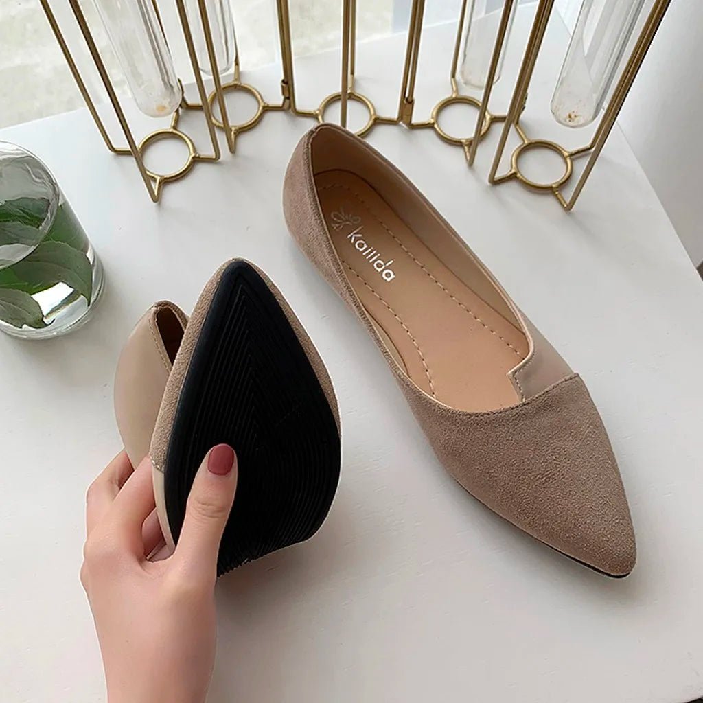 Pointed toe flats in soft faux suede with a black sole, showcasing comfort and style for everyday wear.