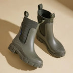 Chelsea rain boots, waterproof rubber Wellington boots with ribbed elastic collar in olive green.
